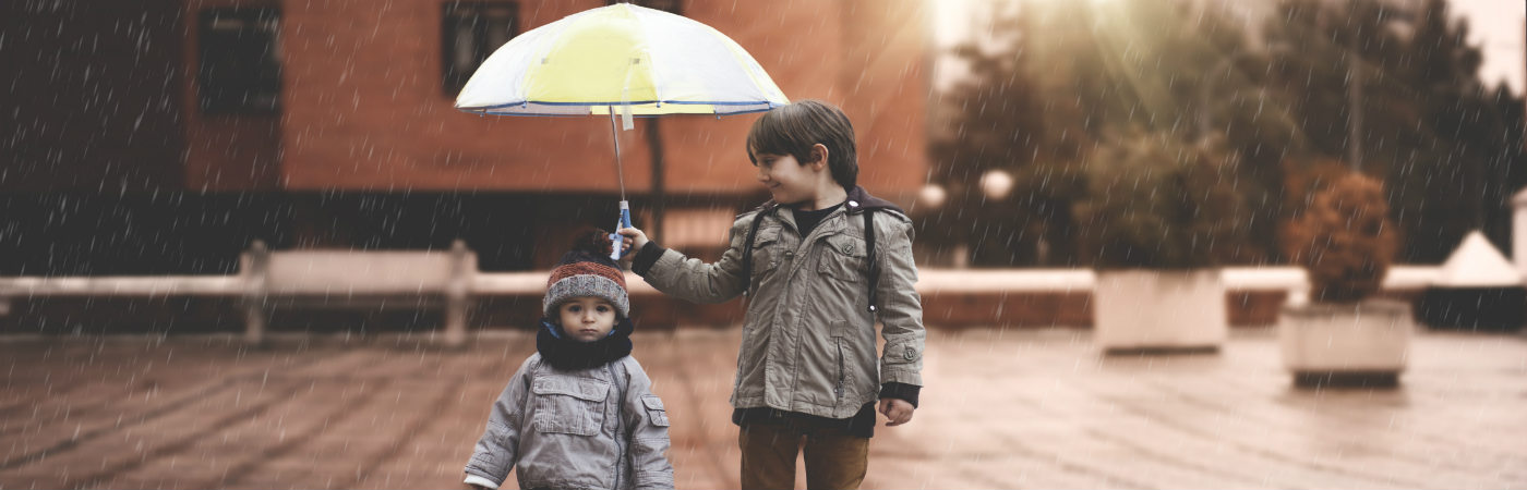 brothers-under-umbrella.jpg